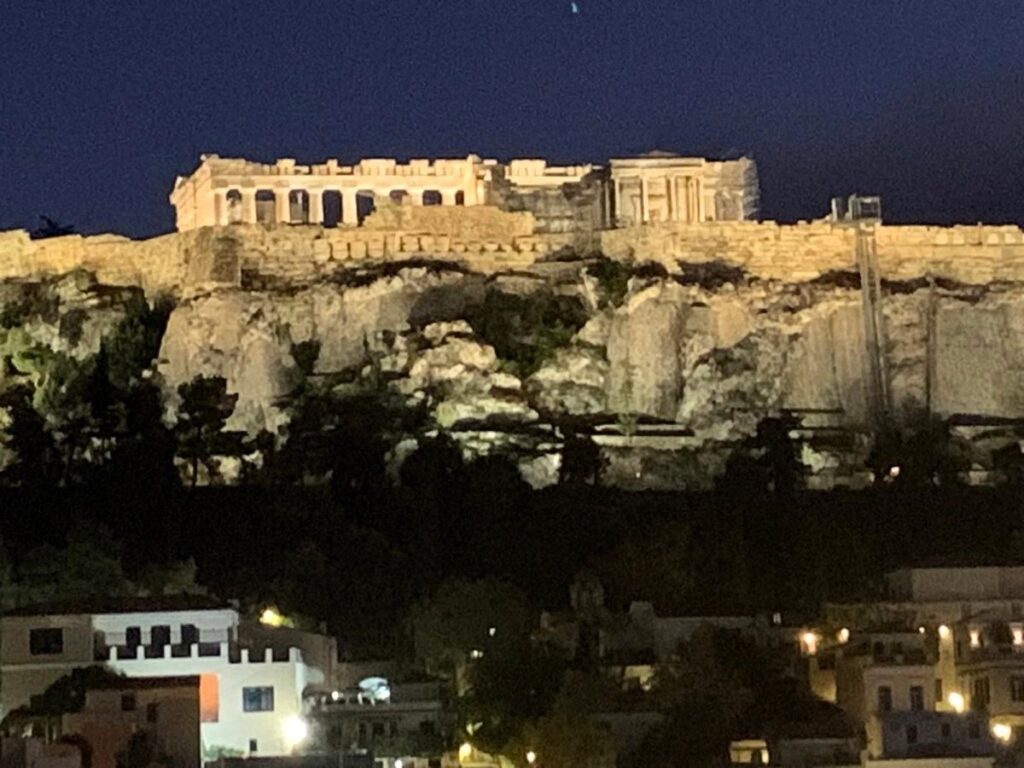 View of the Acropolis at night from Anglais Rooftop bar in Athens