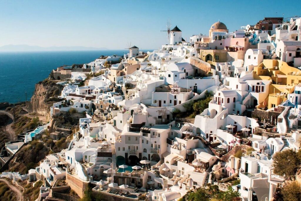 The beautiful white houses of Santorini Island in Greece seen in every Greek Travel Guide