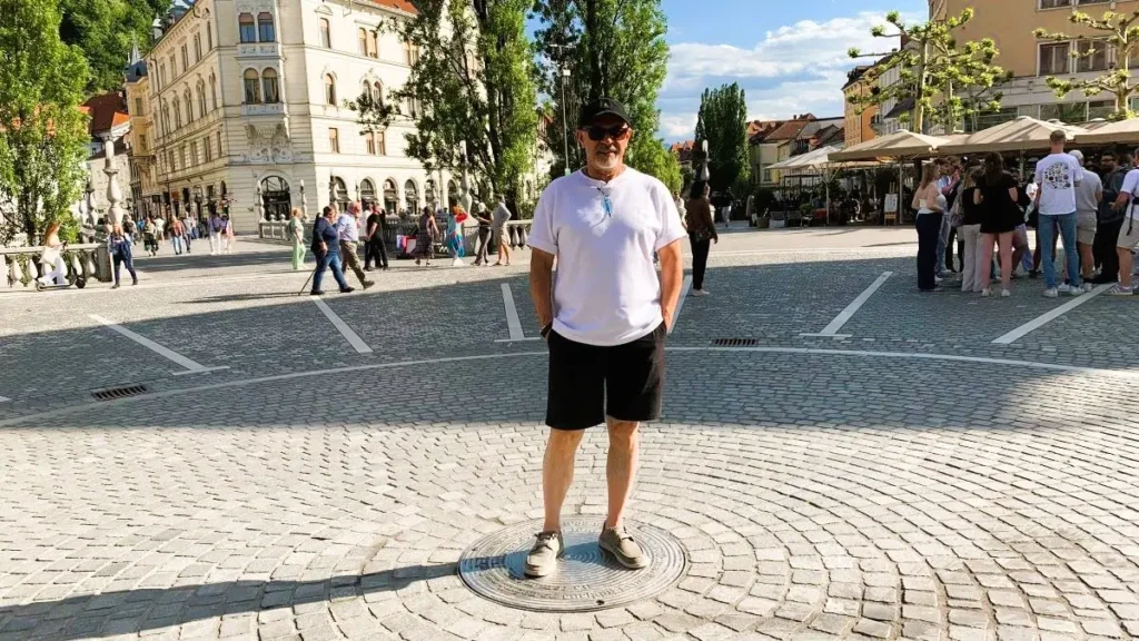 Nusi is standing in the centre of Preseren Square, which is the centre of Ljubljana