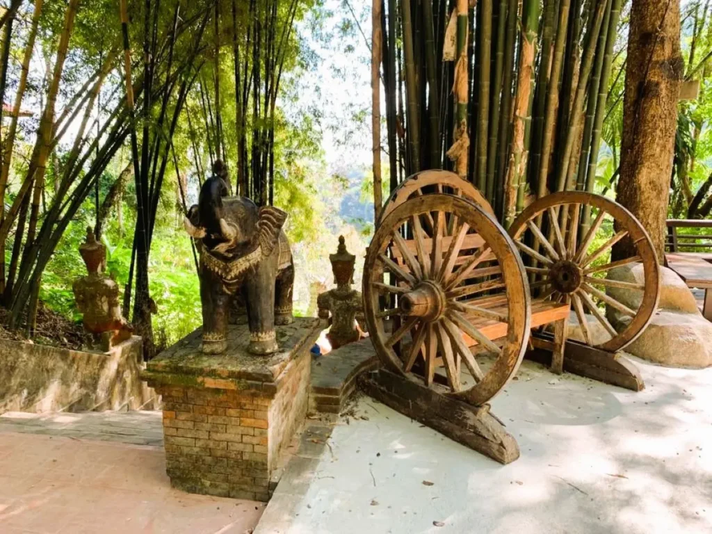The enchanting Wat Pha Lat Elephant statue and cart wheel