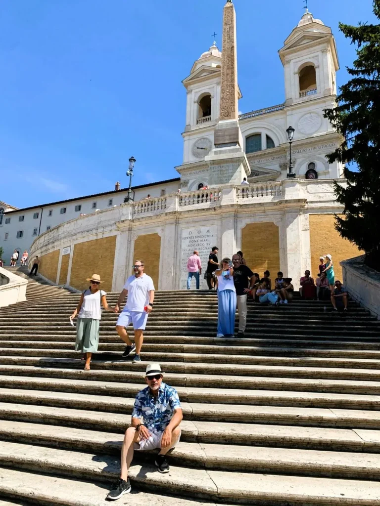 Nusi sitting on the Spanish Steps in Rome - best 3 day itinerary in Rome