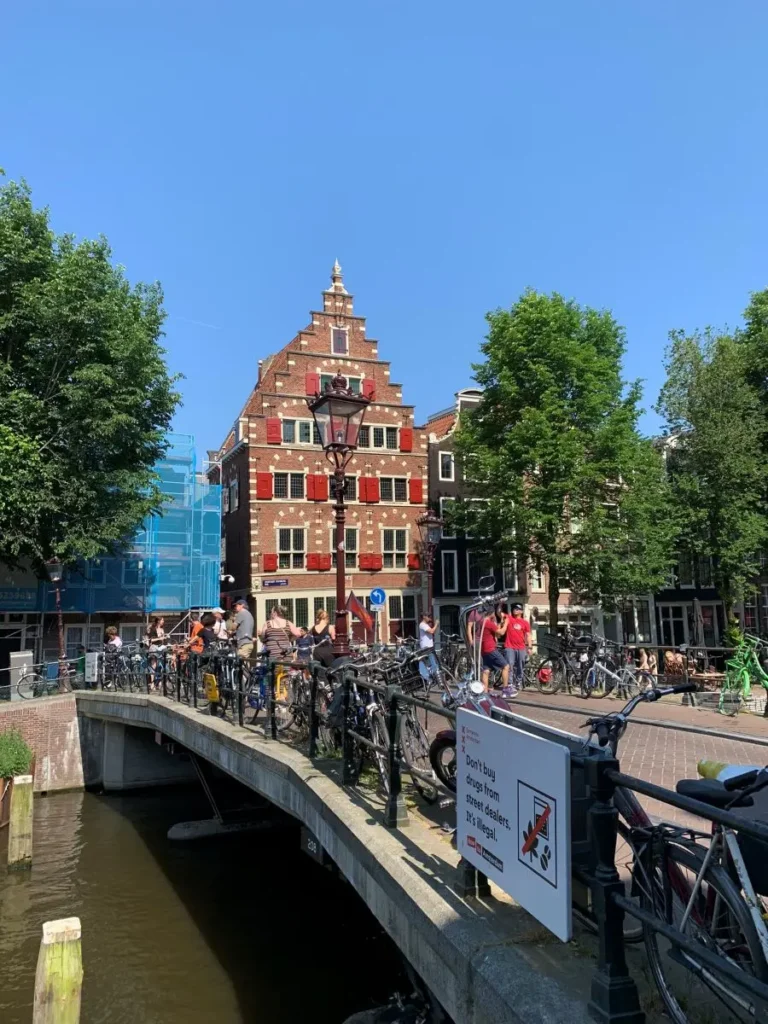 Bridge and a typical 17th century stepped gable house in the Red Light District of Amsterdam
